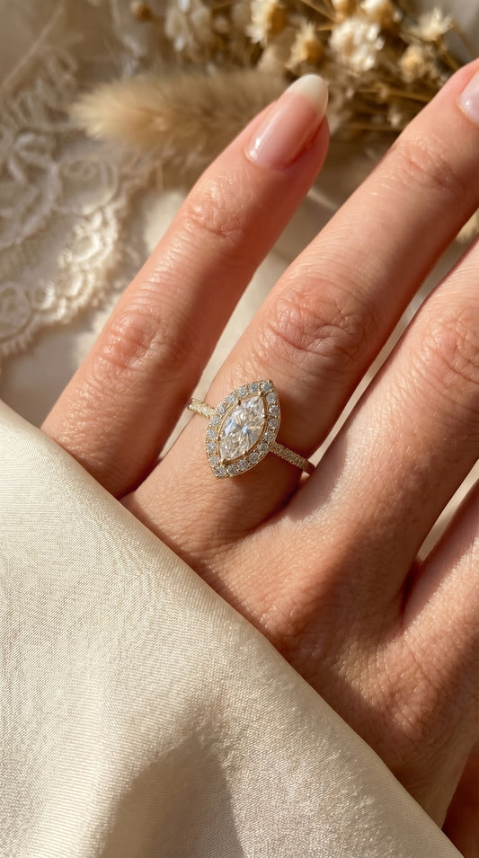 Marquise cut diamond Side Stone Engagement ring