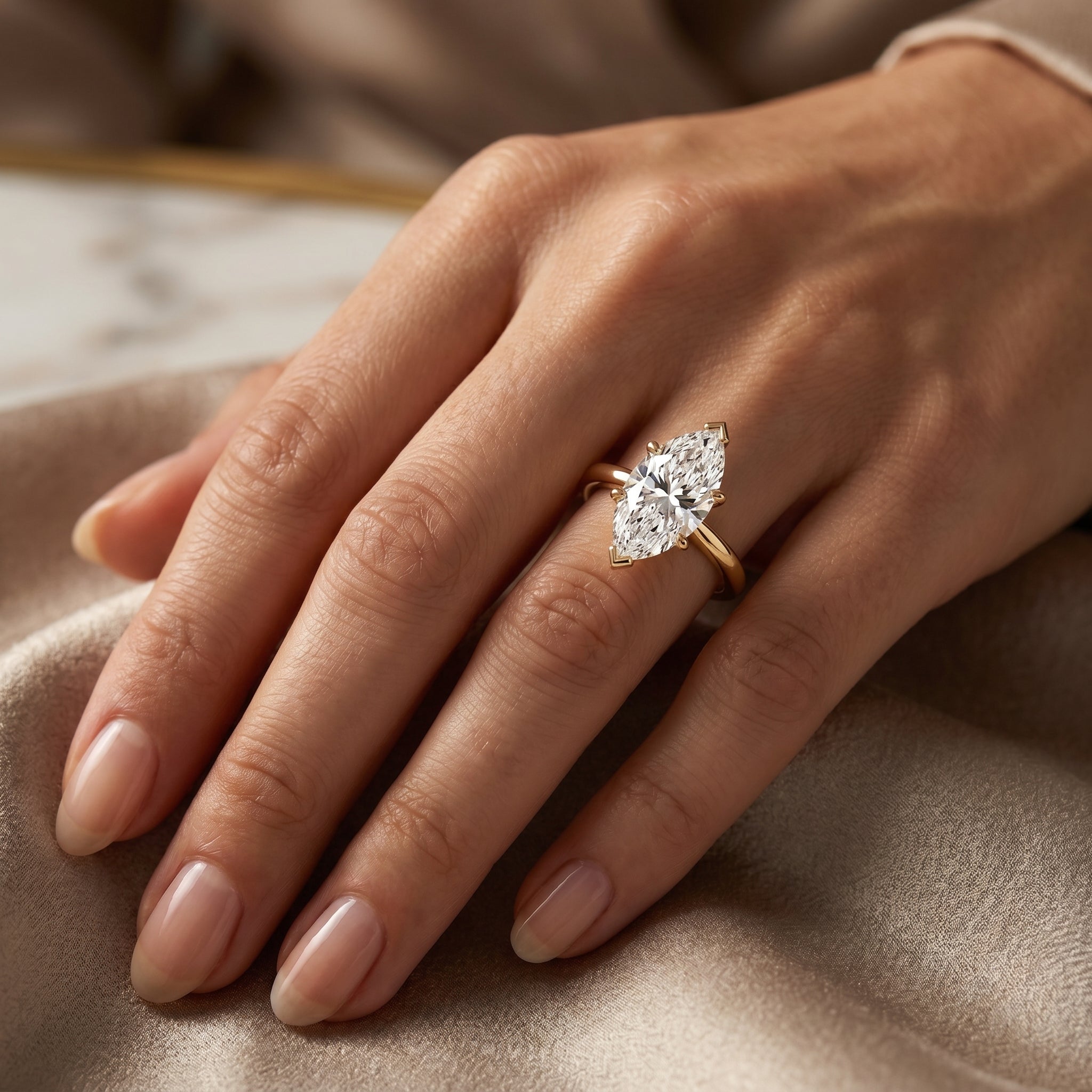 Marquise-cut solitaire engagement ring