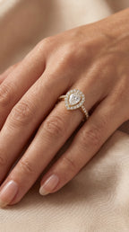 Pear Cut Diamond Side Stone Engagement Ring