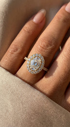 Elegant Oval Diamond Side Stone Pavé Engagement Ring