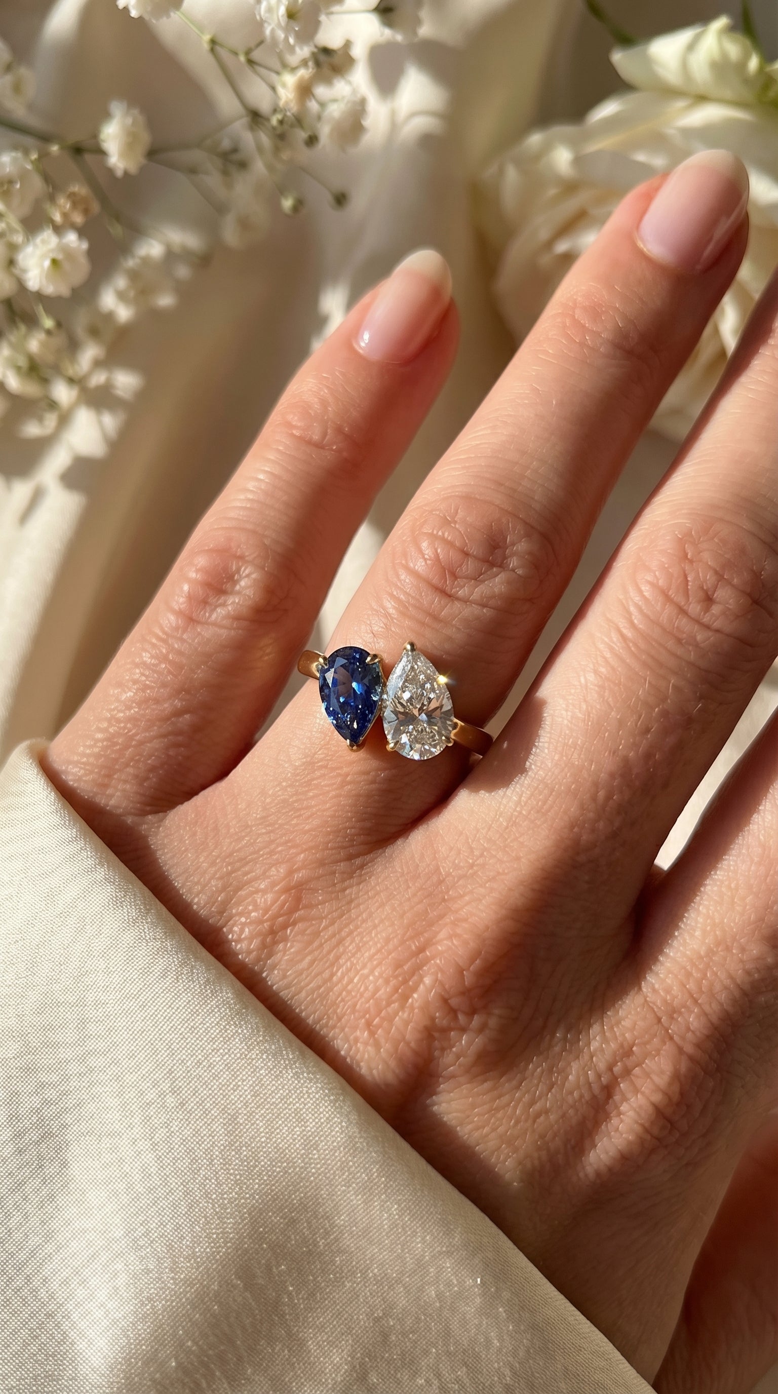 Luxury Toi et Moi Ring with Blue Sapphire and Pear Shape Diamond