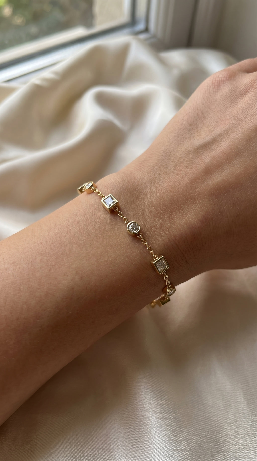 Modern Diamond Station Bracelet with Alternating Round & Princess-Cut Bezel Set Diamonds