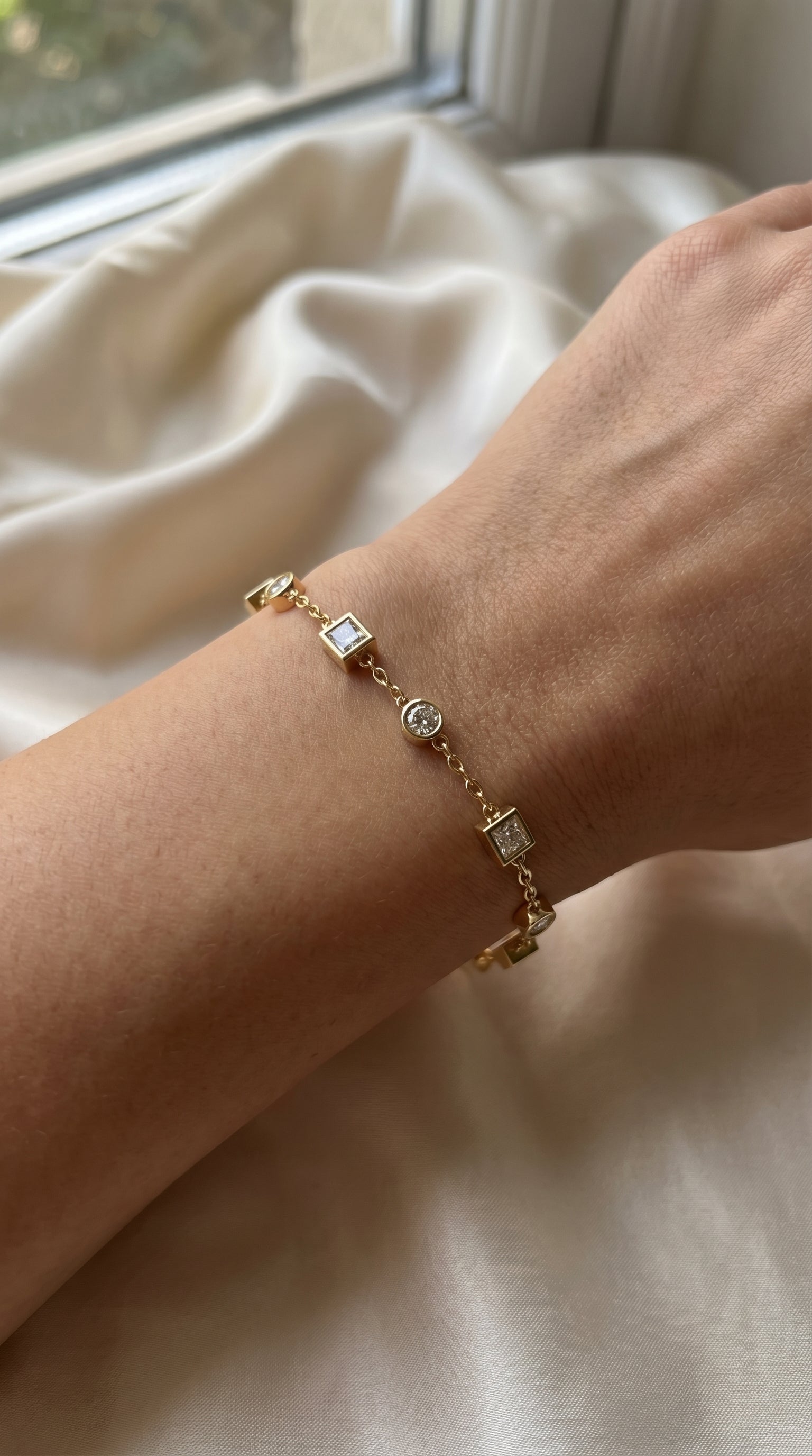Modern Diamond Station Bracelet with Alternating Round & Princess-Cut Bezel Set Diamonds