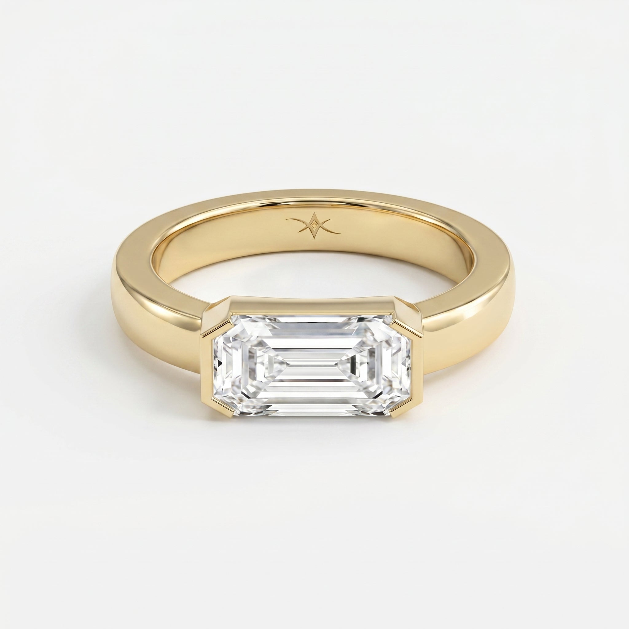 Bar Channel Setting Emerald Shape Diamond Solitaire Ring