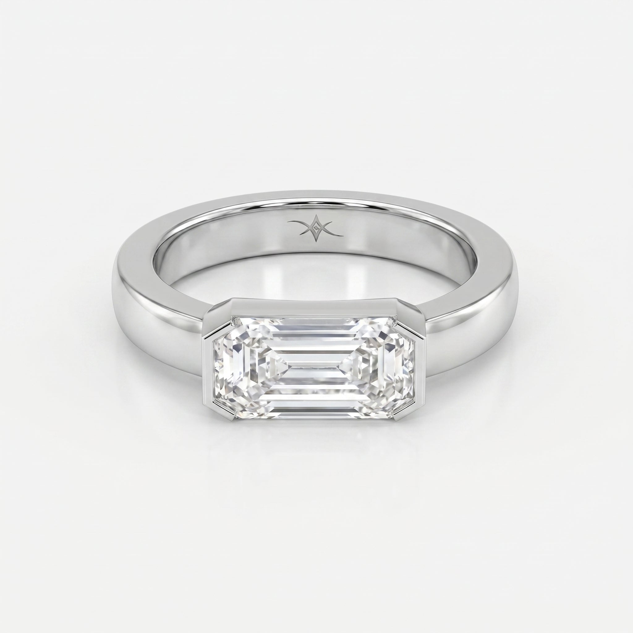 Bar Channel Setting Emerald Shape Diamond Solitaire Ring