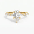 Elegant Pear Cut Diamond Side Stones Engagement Ring