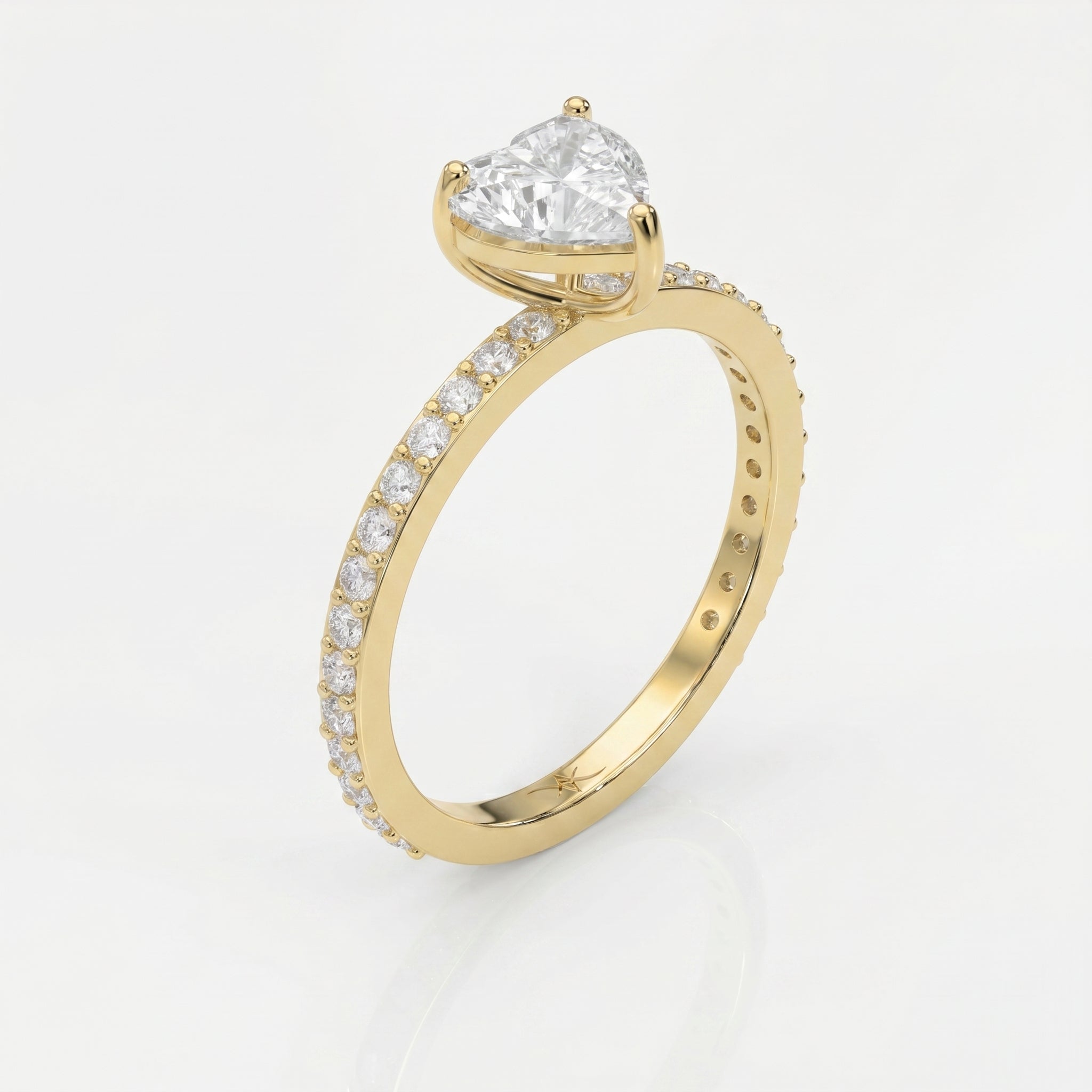 Heart Shape Diamond Side Stone Engagement Ring