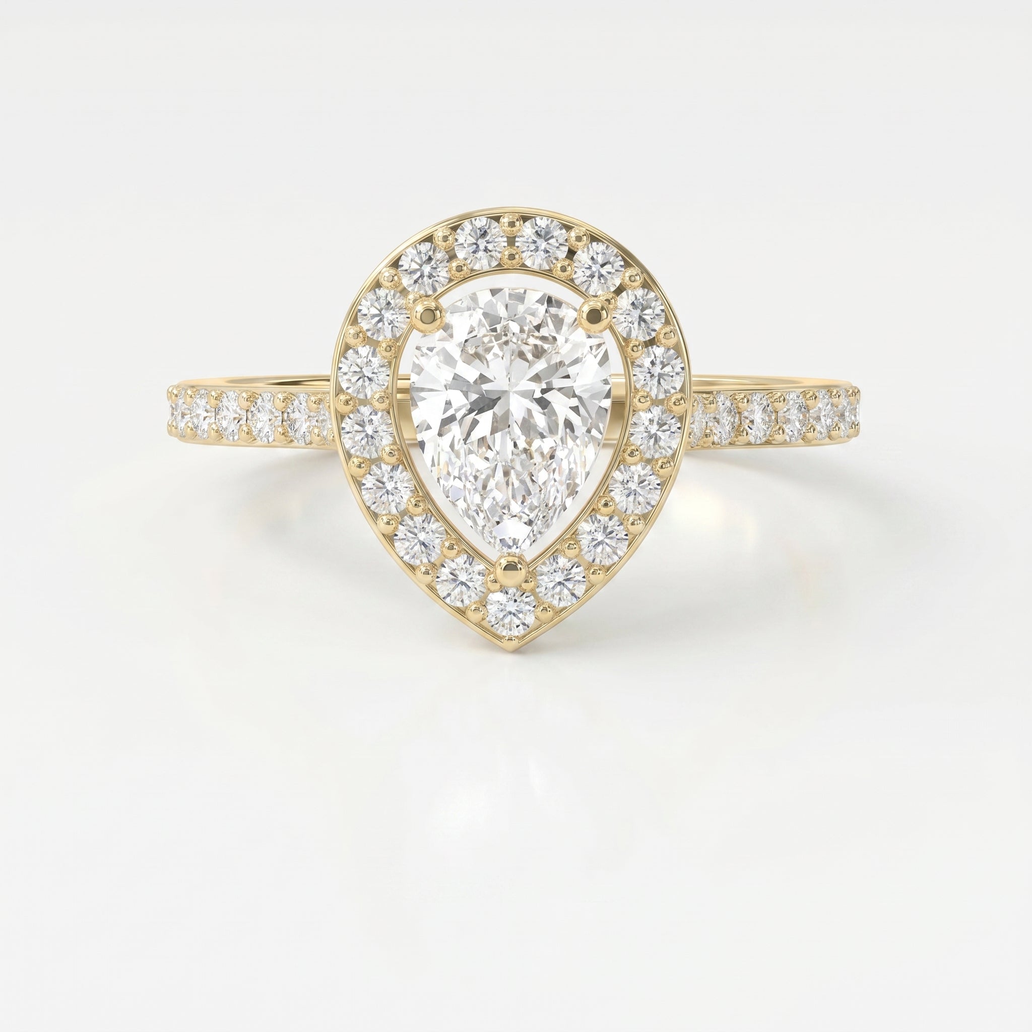 Pear Cut Diamond Side Stone Engagement Ring