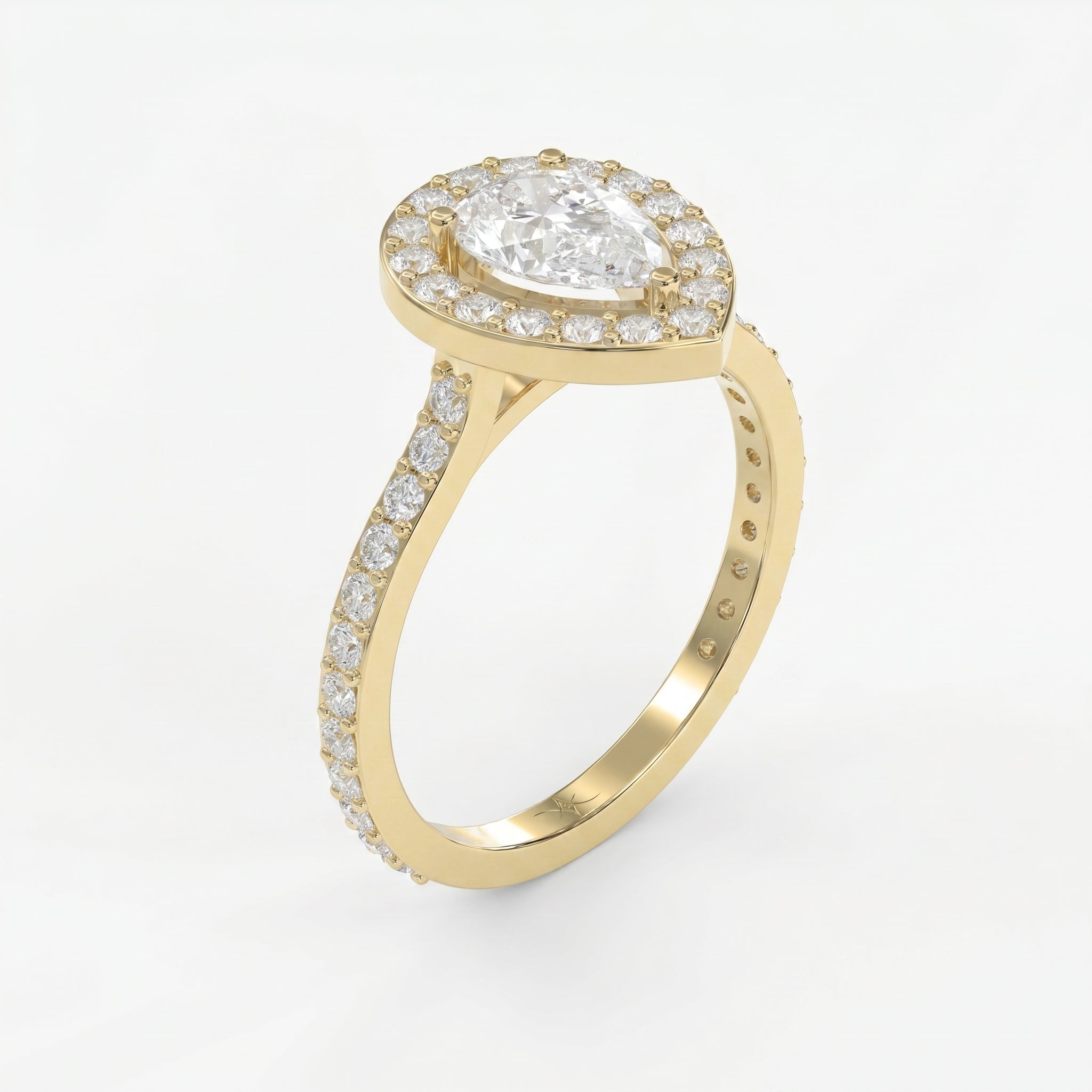 Pear Cut Diamond Side Stone Engagement Ring