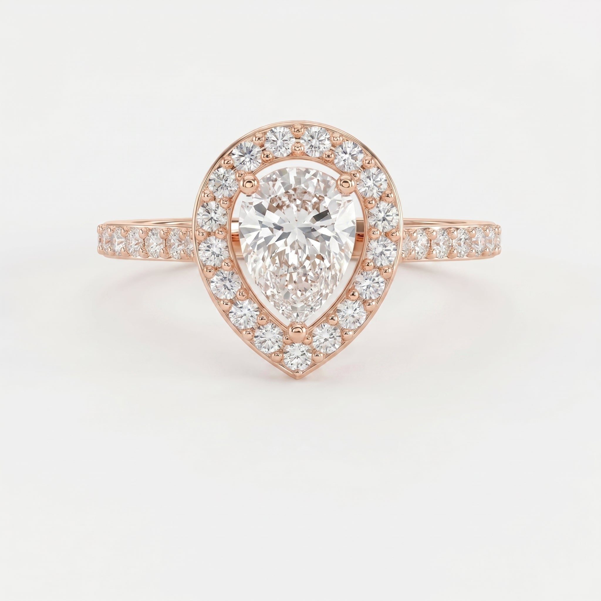 Pear Cut Diamond Side Stone Engagement Ring
