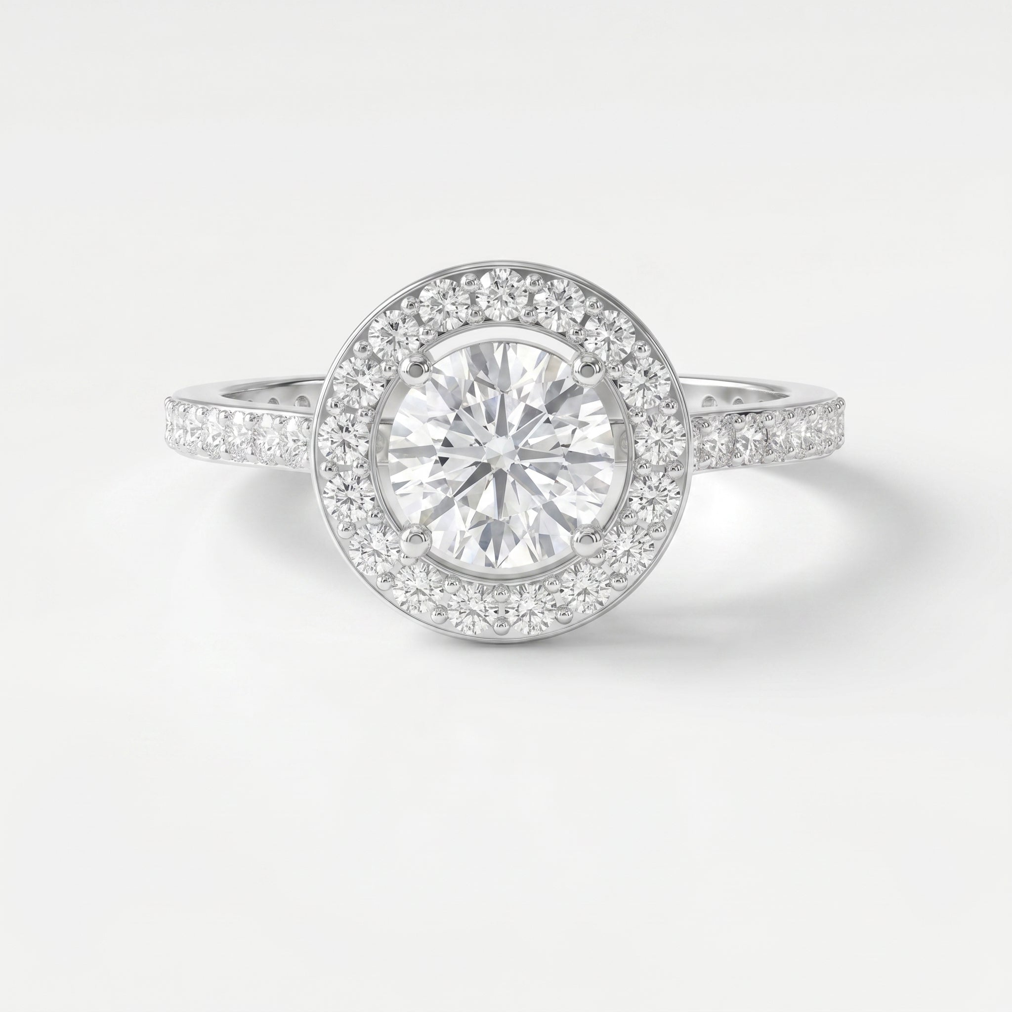 Round Cut Diamond Side Stone Engagement Ring