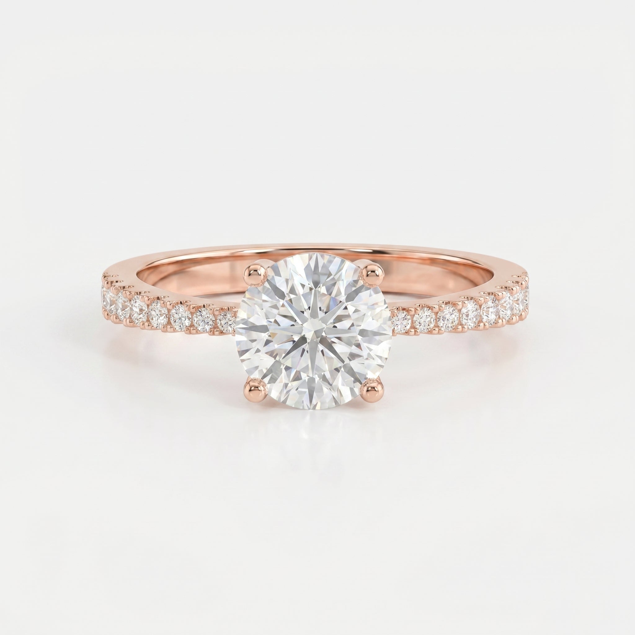 Elegant Round Cut Diamond Side Stone Ring with Pavé Band