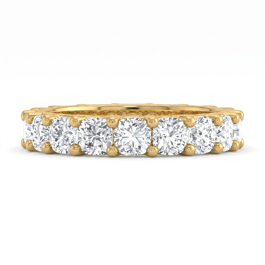 Gold ring with multiple diamonds on a white background