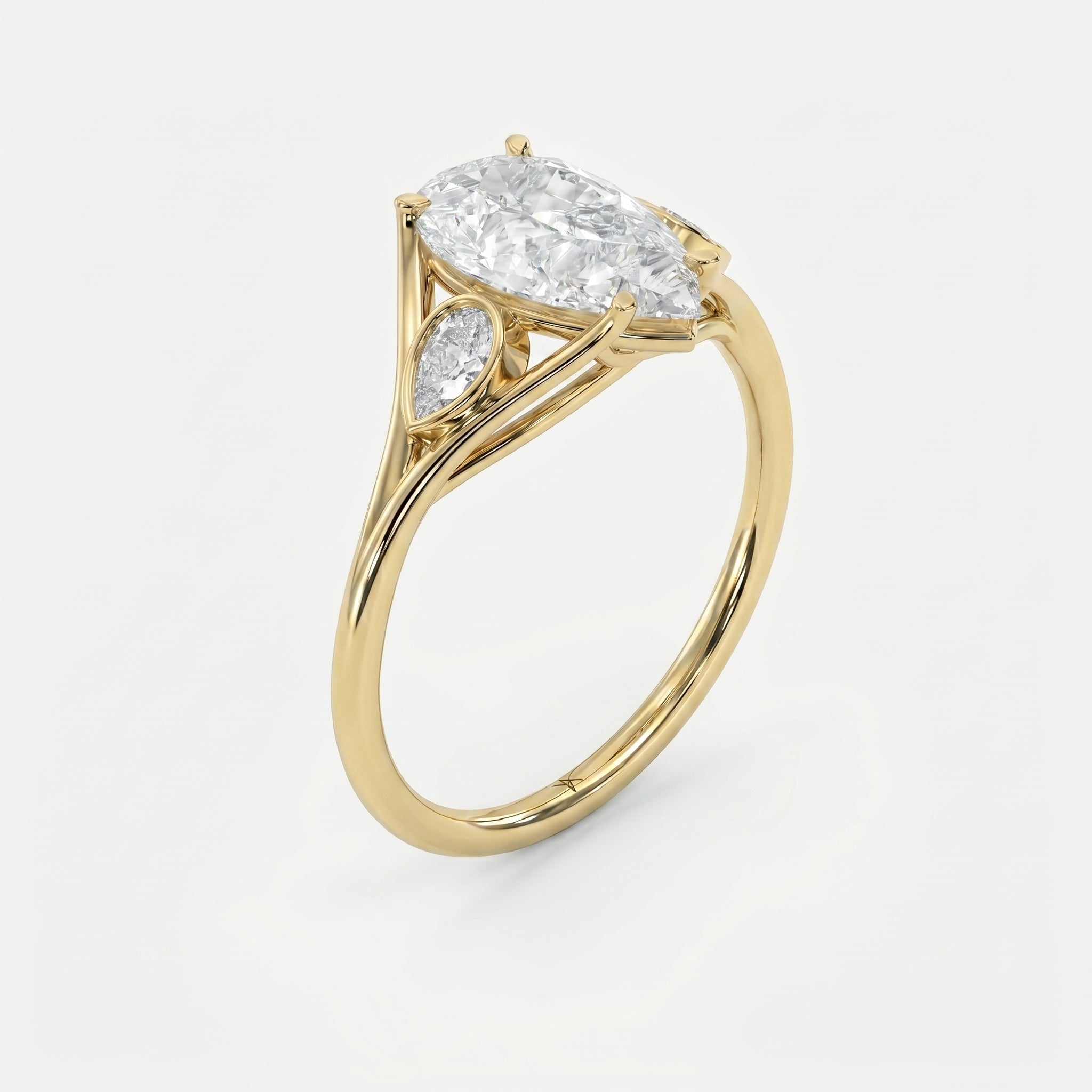 Custom 4‑Prong Diamond Ring with Bezel‑Set Pear Side Stones