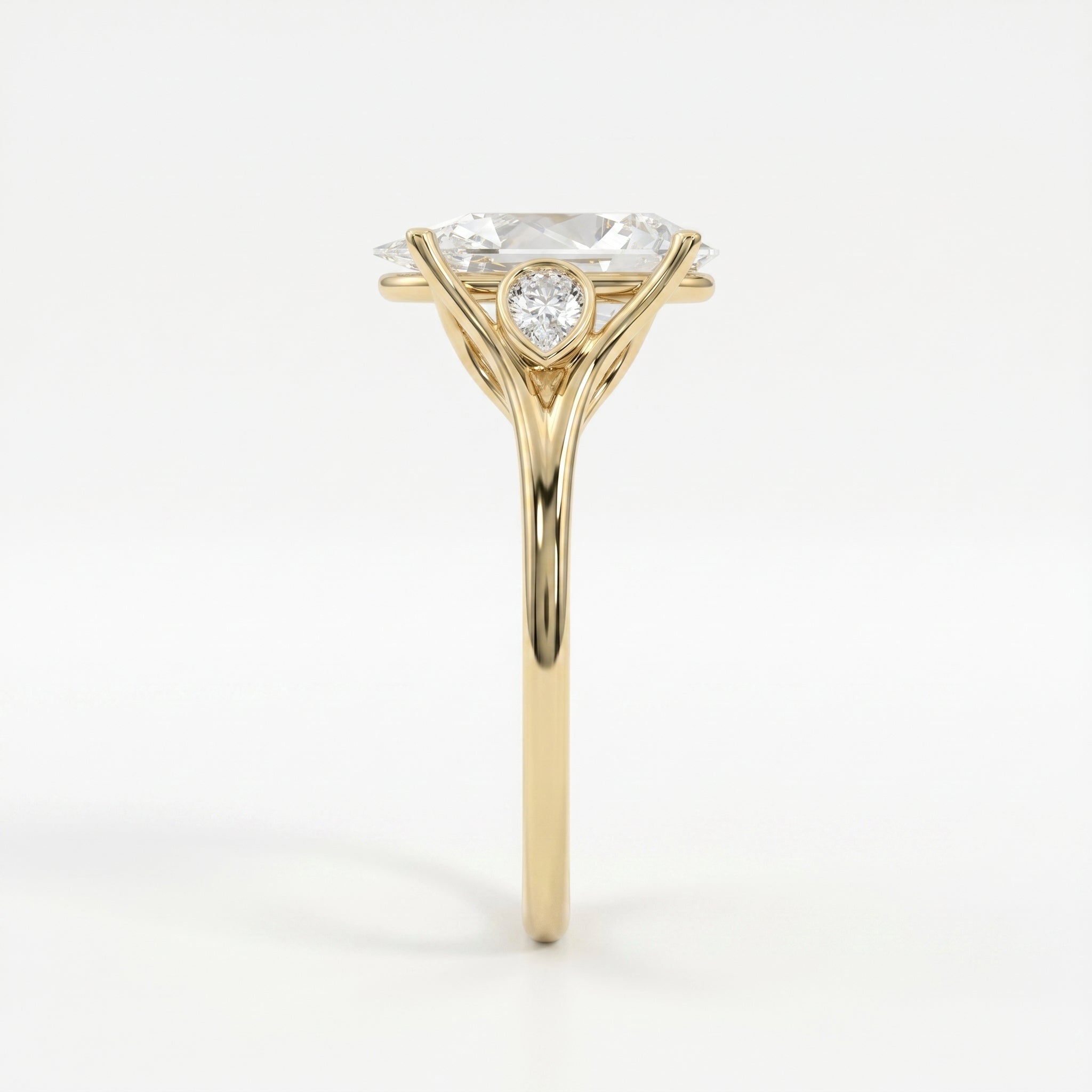 Custom 4‑Prong Diamond Ring with Bezel‑Set Pear Side Stones