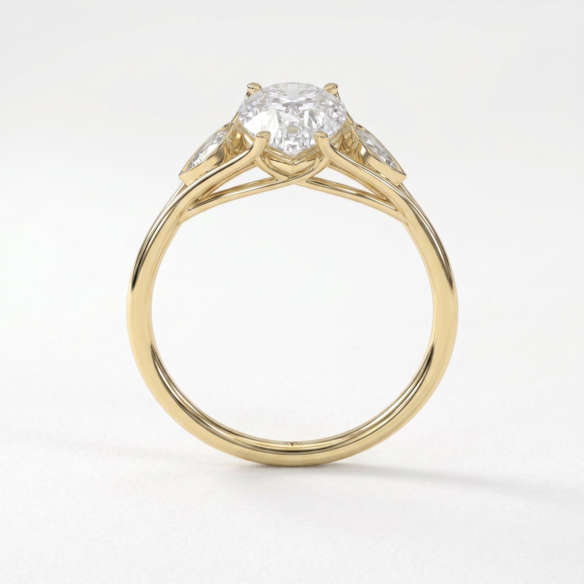 Custom 4‑Prong Diamond Ring with Bezel‑Set Pear Side Stones