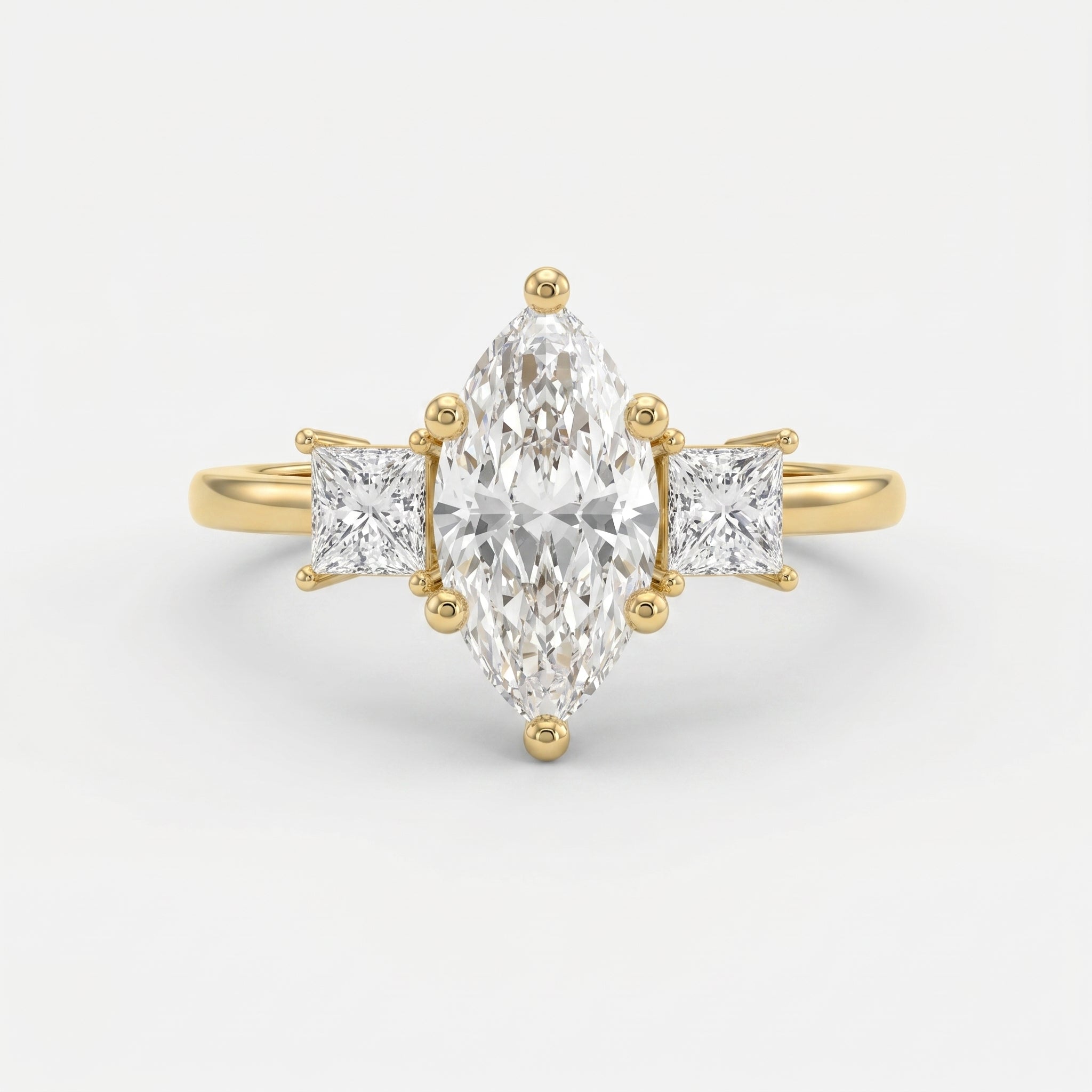 The Prism Three-Stone Marquise
