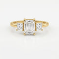 The Axis Trio Emerald Ring