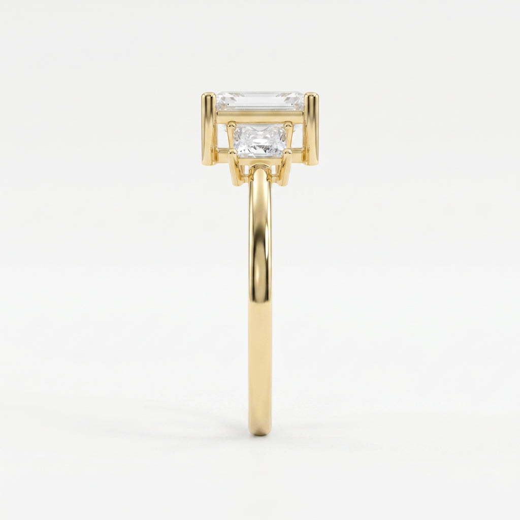The Axis Trio Emerald Ring