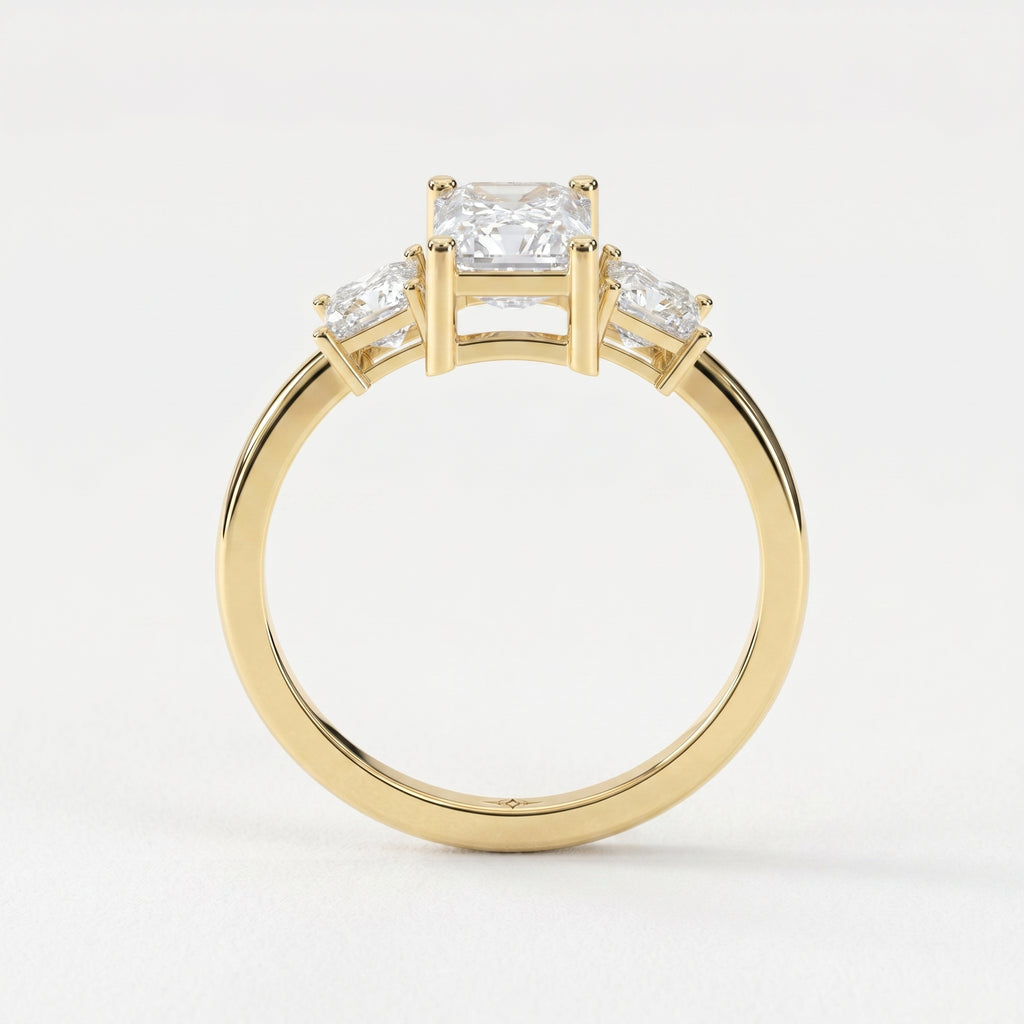 The Axis Trio Emerald Ring