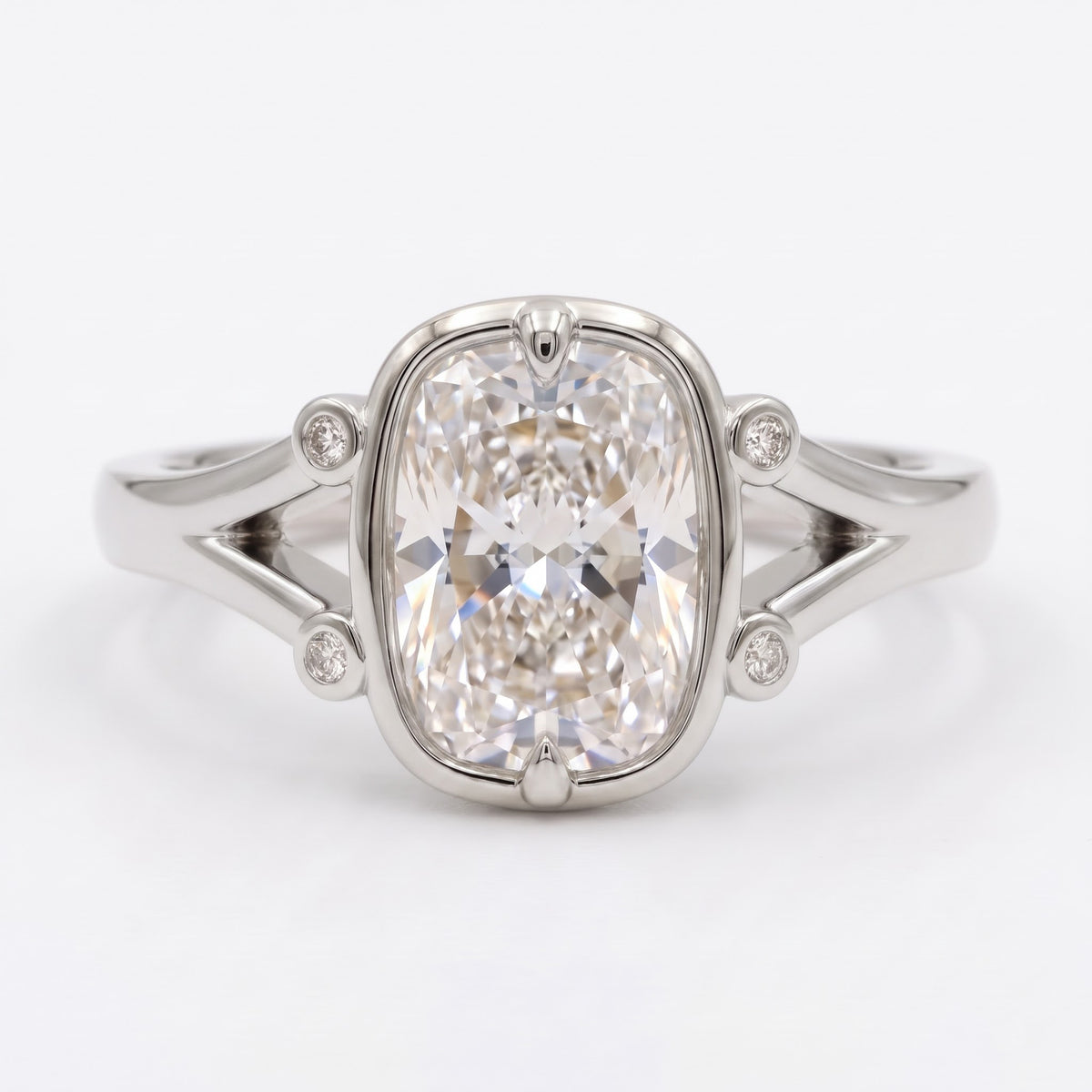 Lumière Bezel Split-Shank Long Cushion Diamond Side Stone Ring