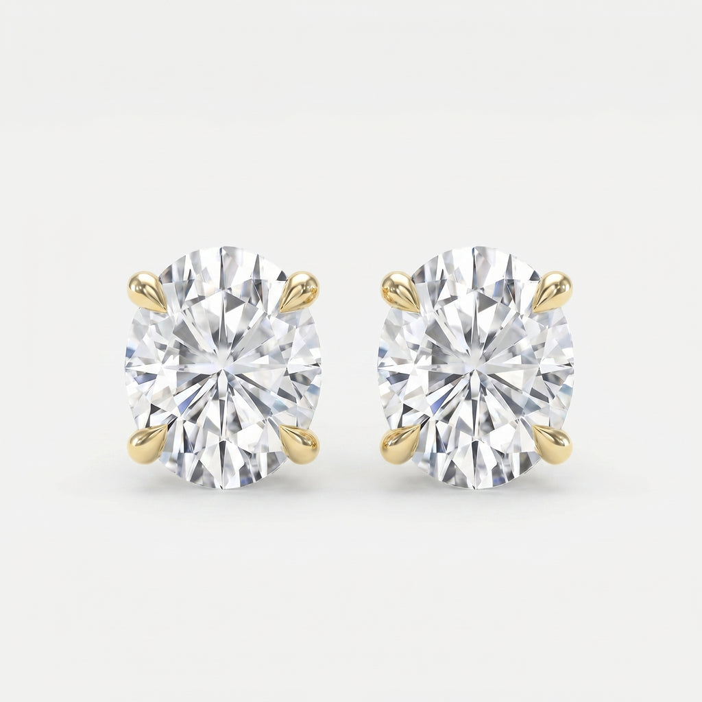 Pair of diamond stud earrings on a light gray background