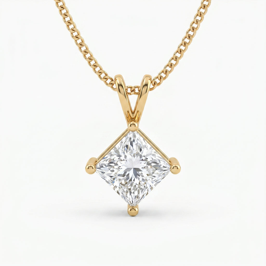 Gold necklace with a diamond pendant on a white background