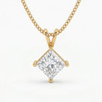 Gold necklace with a diamond pendant on a white background
