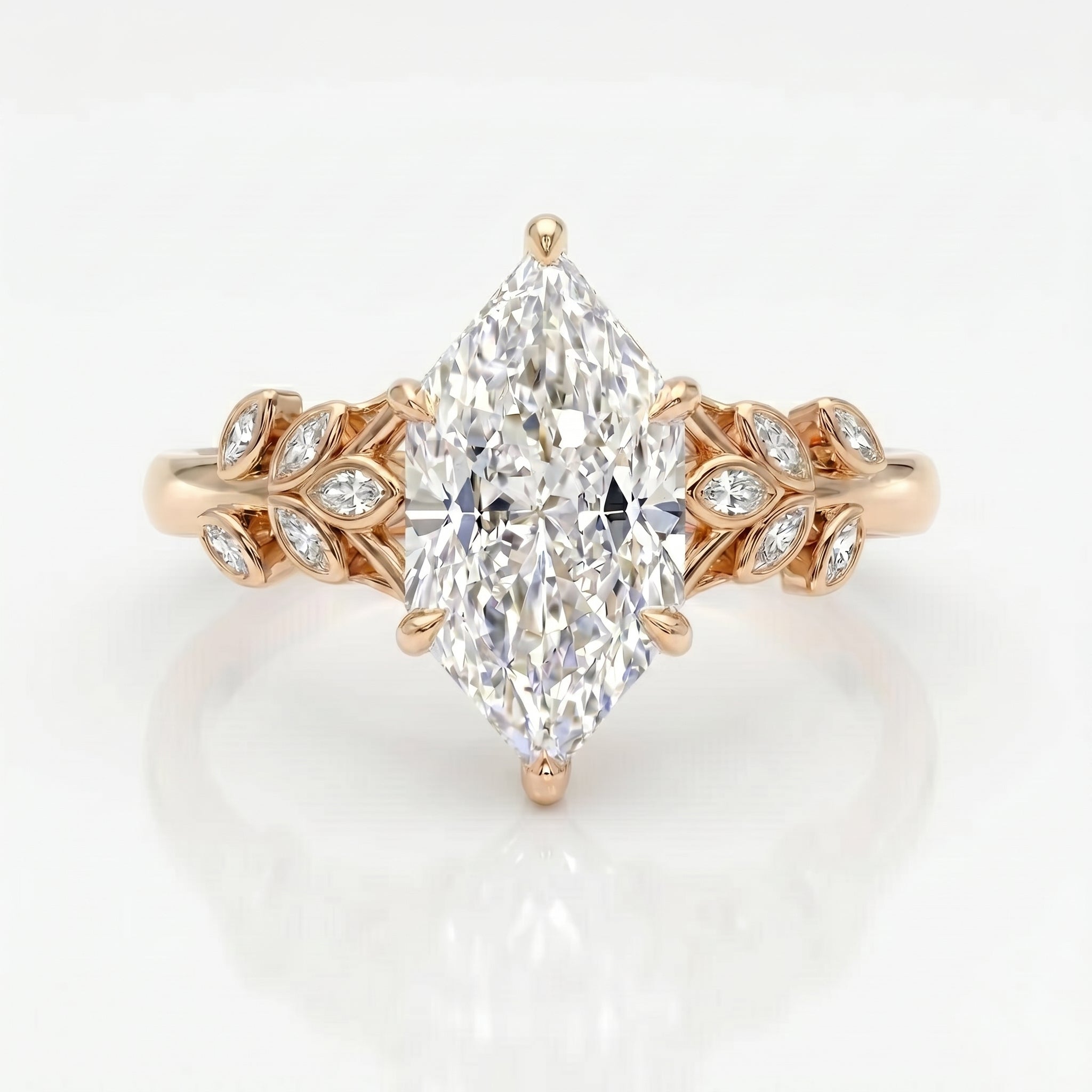 Marquise diamond engagement ring with leaf accent band in rose gold, luxury nature-inspired bridal jewelry