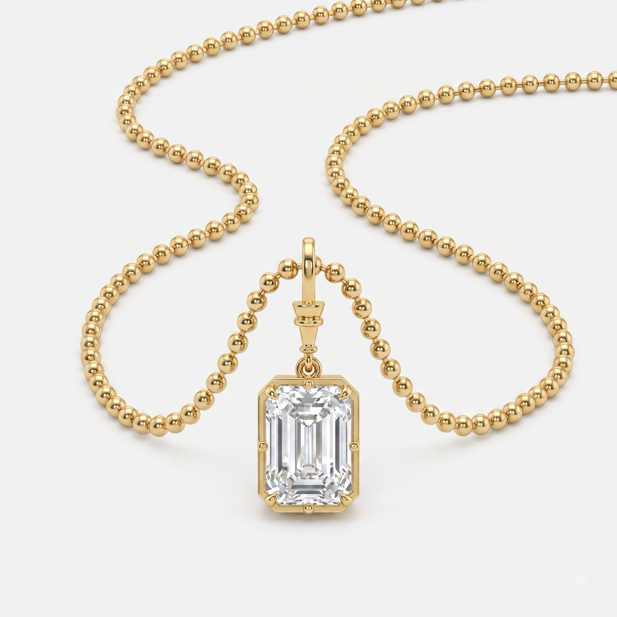 Elegant Emerald-Cut Solitaire Pendant with Beaded Gold Chain