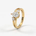Celestial Embrace Pear Diamond three Stone Ring