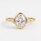 Elegant Oval Diamond Bezel Setting Side-Stone Ring