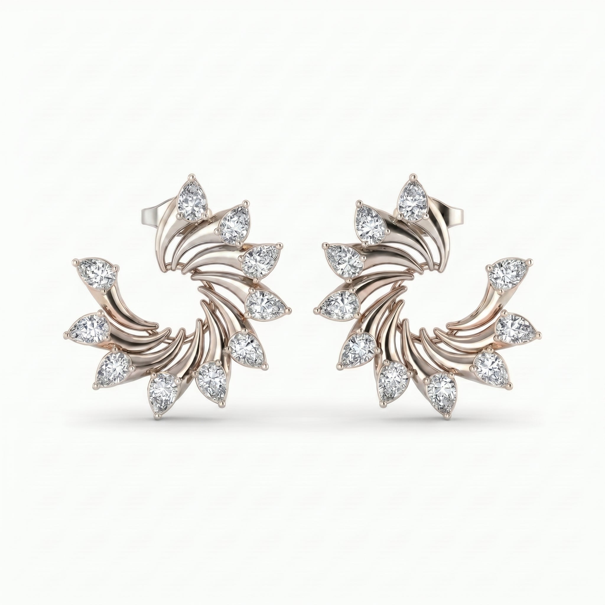 Luxury rose gold swirl earrings with pear-shaped diamonds shown in detailed 45-degree studio lighting