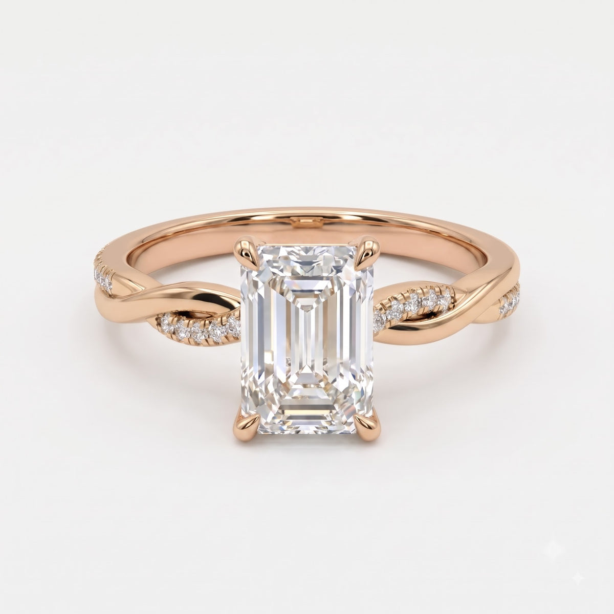 The Lumière Emerald Cut Diamond Twisted Pavé Side Stone Ring