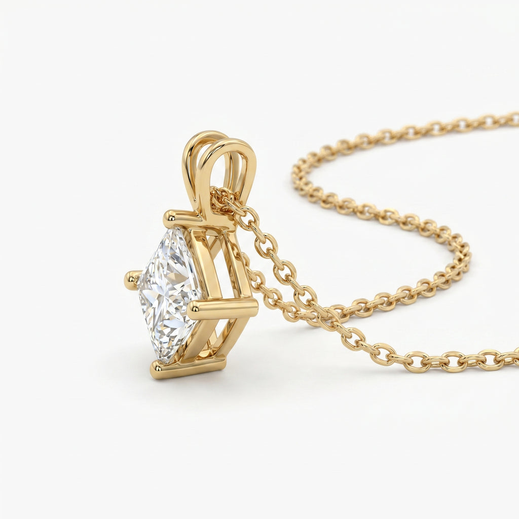Gold necklace with a diamond pendant on a white background