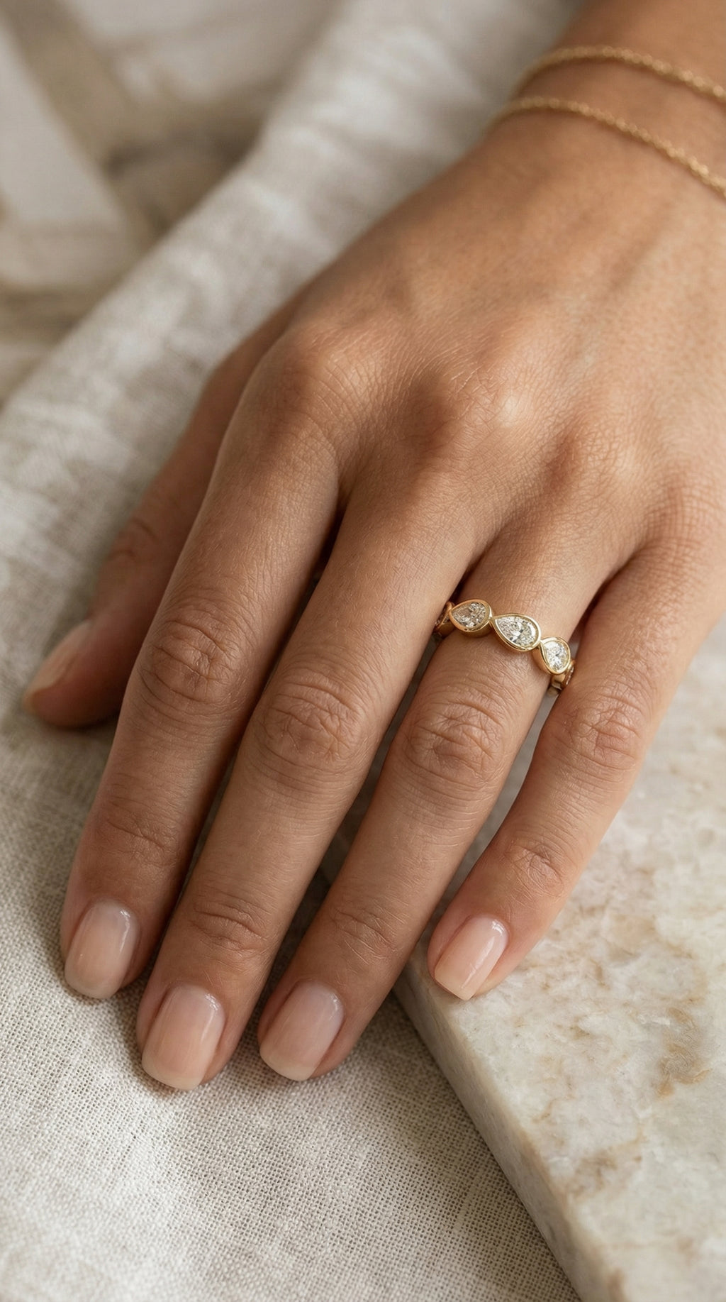 Bezel Set Pear Cut Diamond Ring
