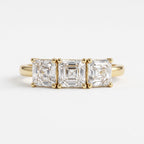 Modern Luxury three matching Ascher-cut diamonds Eternity Ring