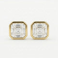 Gold earrings with Asscher-cut gemstones on a white background