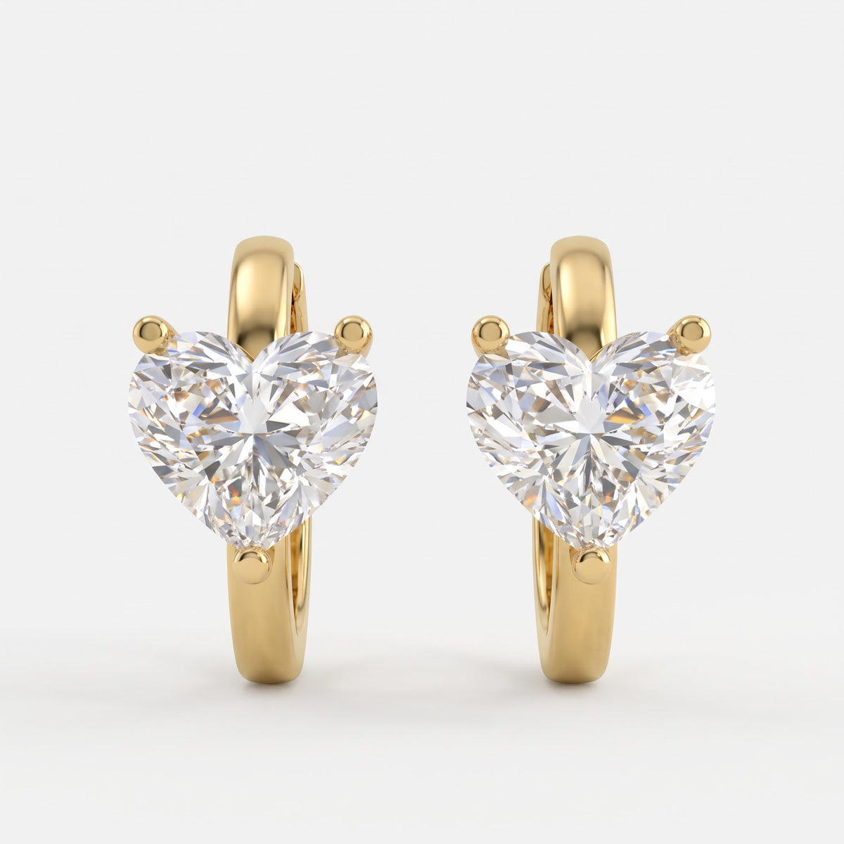 Élan Heart-shaped diamond huggie Hoops earrings