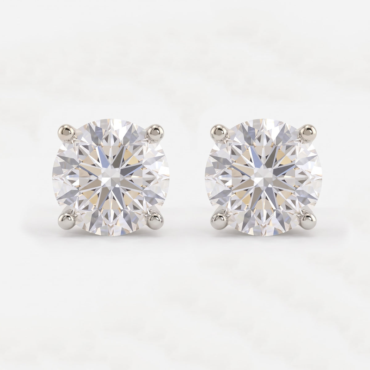 Celestia Radiance 4-Prong Round Diamond Stud Earrings