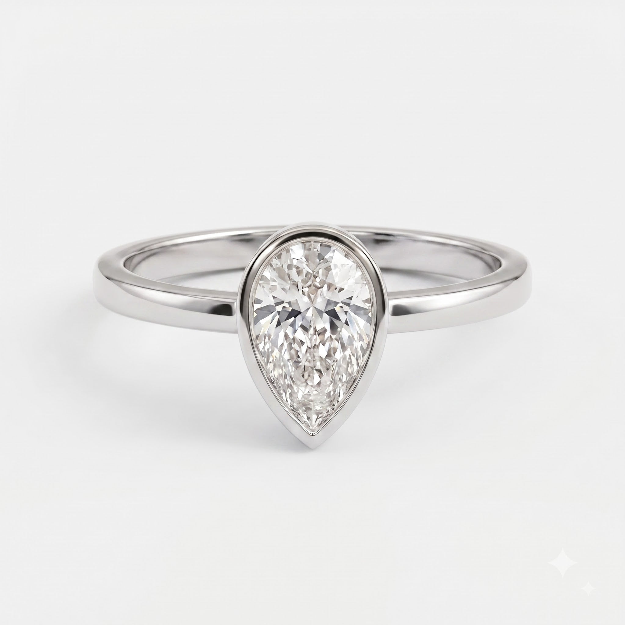 Vela Pear Diamond Bezel Setting Solitaire Ring