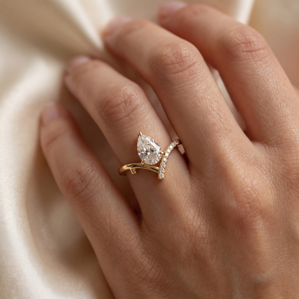 Eternal Sparkle Pear Diamond Side Stone Ring
