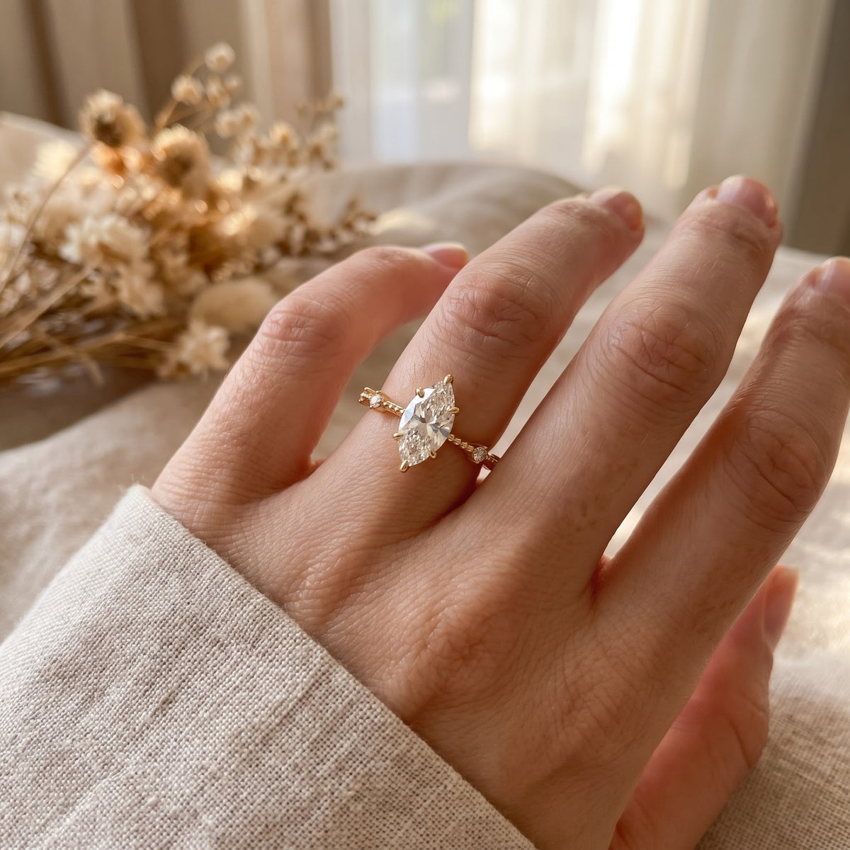 The Royal Marquise Diamond Radiance side stone Ring