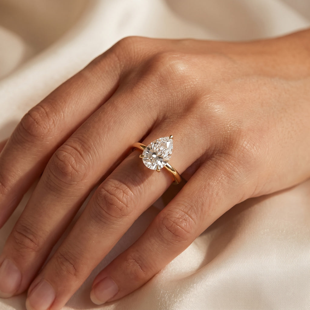 Minimalist Modern Teardrop Pear Cut Diamond Solitaire Ring
