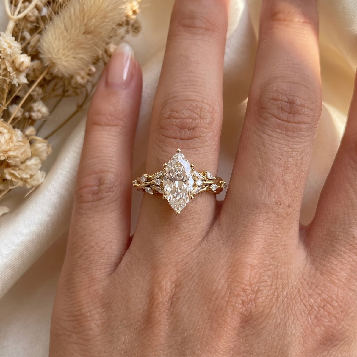 Elegant Floral Vine Marquise Diamond side stone Engagement Ring
