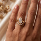 Elegant Marquise cut Diamond V-Shaped Pavé Side Stone Ring
