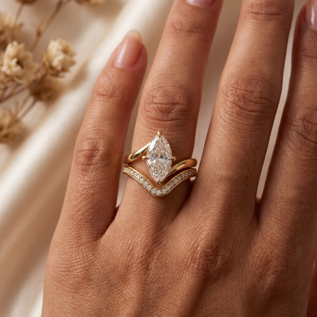 Elegant Marquise cut Diamond V-Shaped Pavé Side Stone Ring