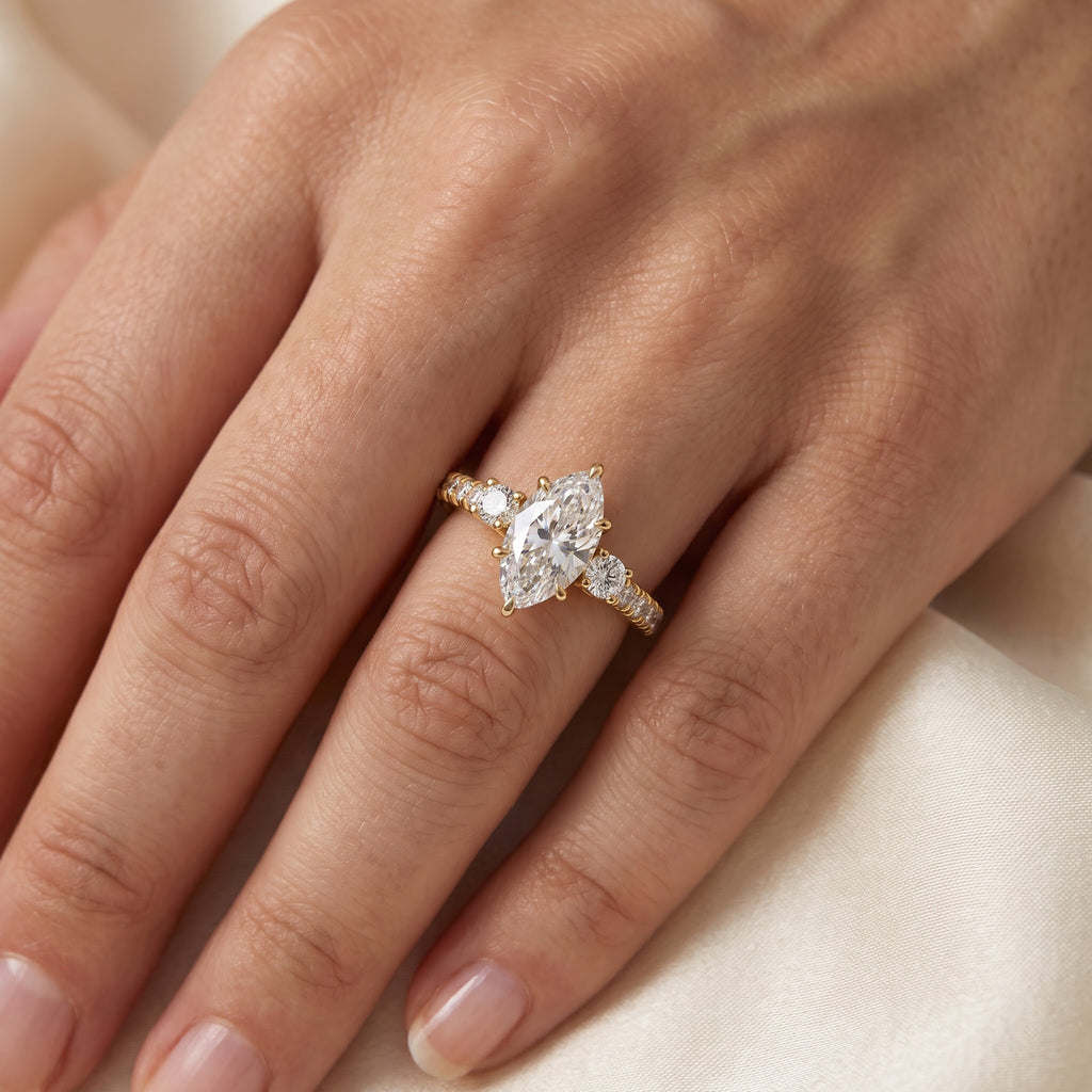 Luxury Celestia Marquise Diamond Side Stone Ring