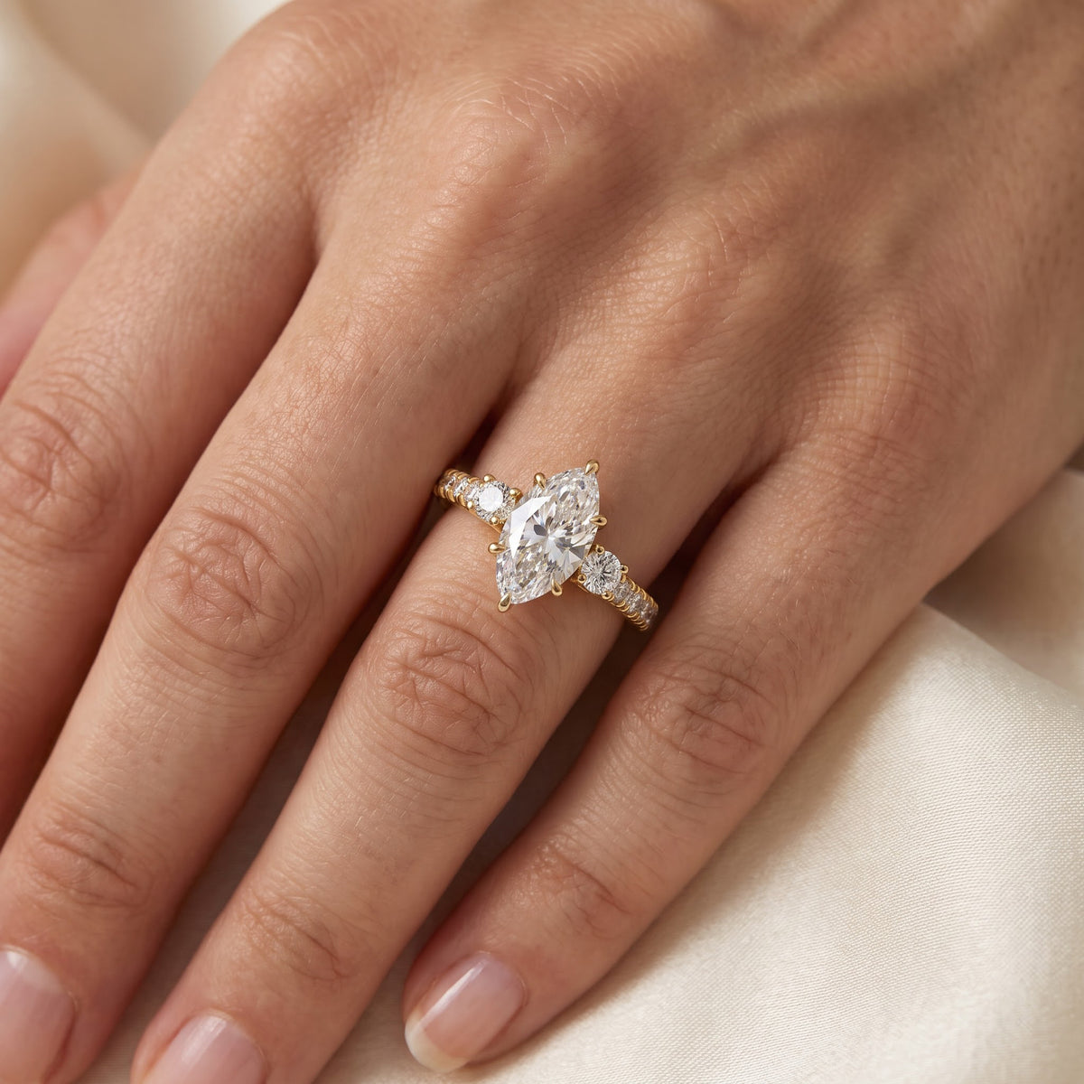 Luxury Celestia Marquise Diamond Side Stone Ring