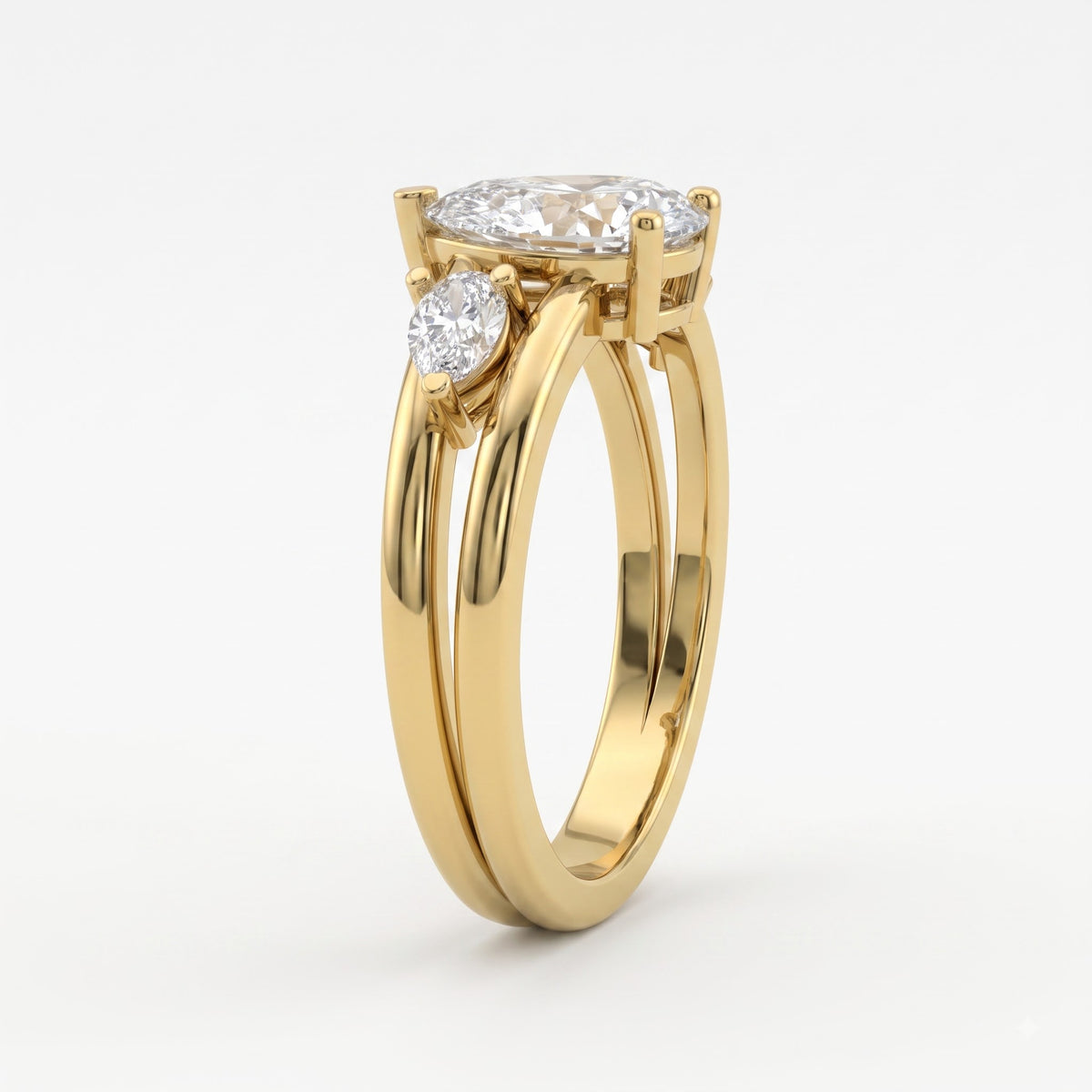 Celestial Embrace Pear Diamond three Stone Ring